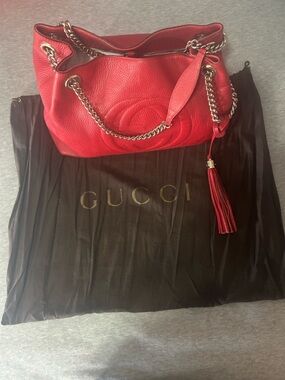 Gucci Red Pebbled Leather Shoulder Bag with Tassel and Chain Strap
